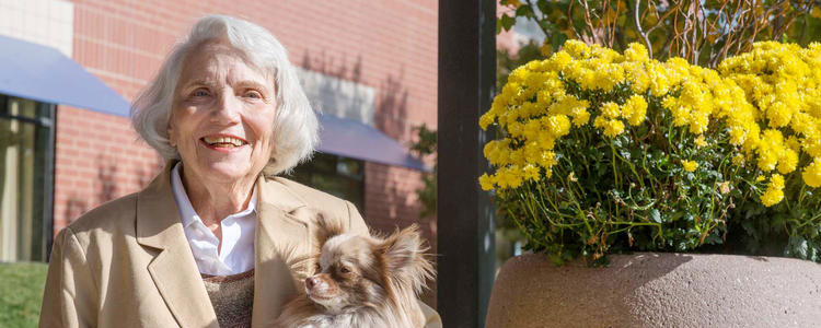 senior woman with dog