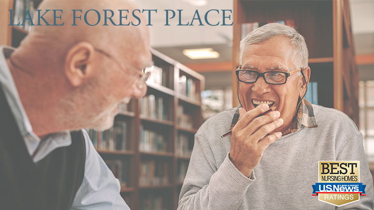 two senior men inside the library at Lake Forest, a senior living community near Chicago