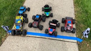Close-up of RC cars crossing the finish line at the Evanston 500 race