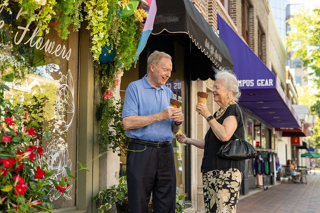 Senior couple eating ice cream in downtown Evanston