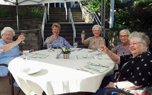 retired seniors at lunch outside 